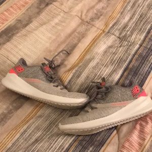 New Balance gray and pink sneakers.